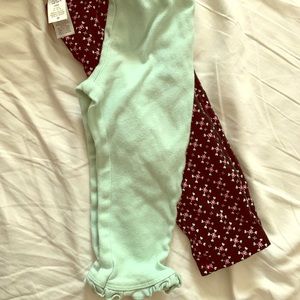 Pair of Carters 18m leggings for girls.